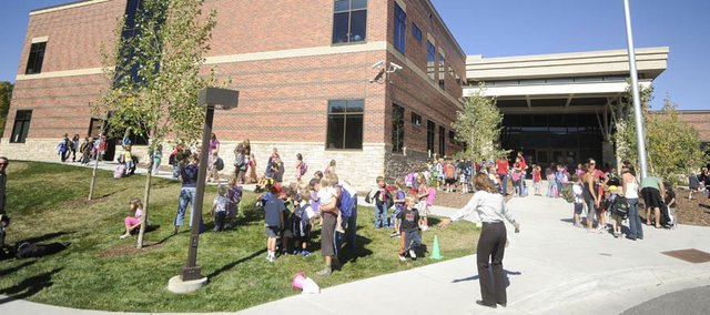 students gathering outside school