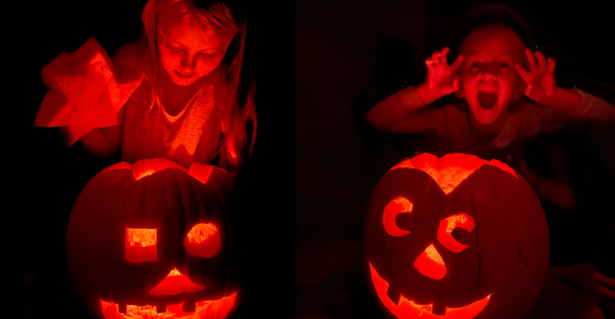 siblings with halloween pumpkind